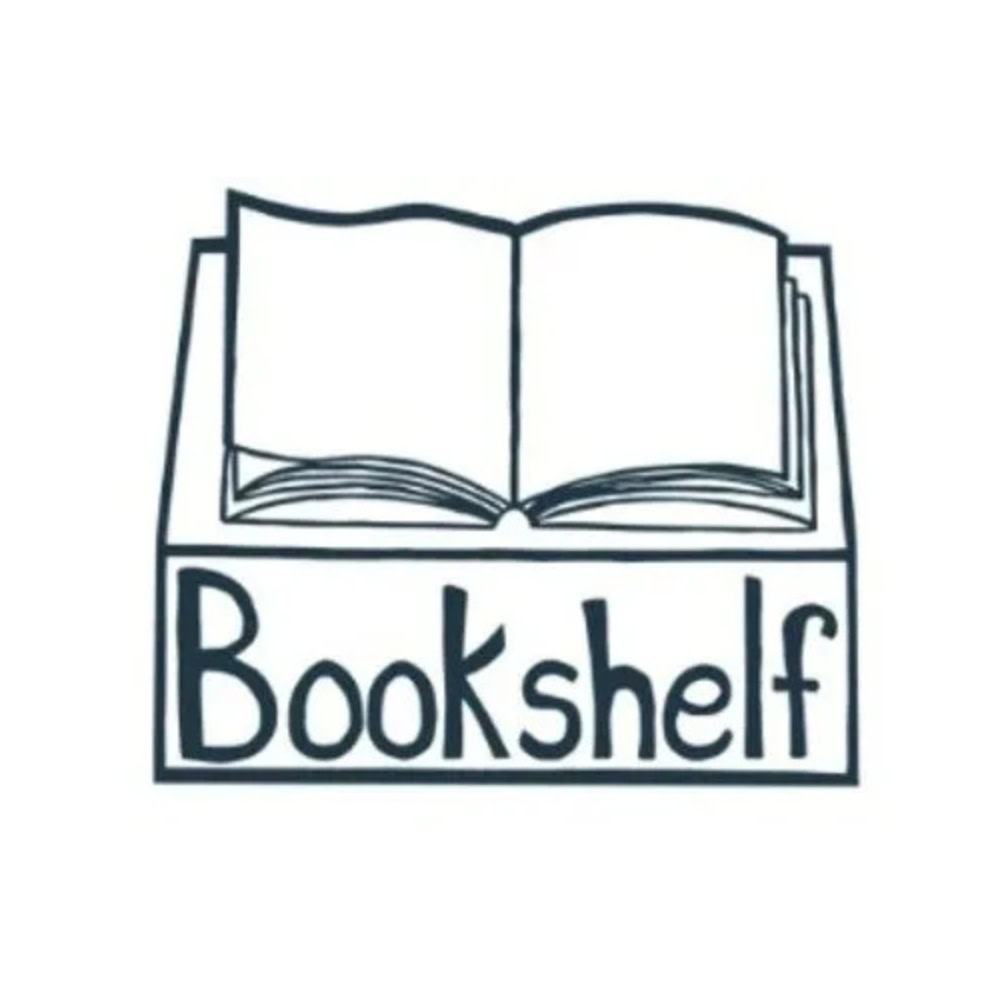 Open book illustration with "Book shelf" text, symbolizing Batesville Main Street's literary and community focus.