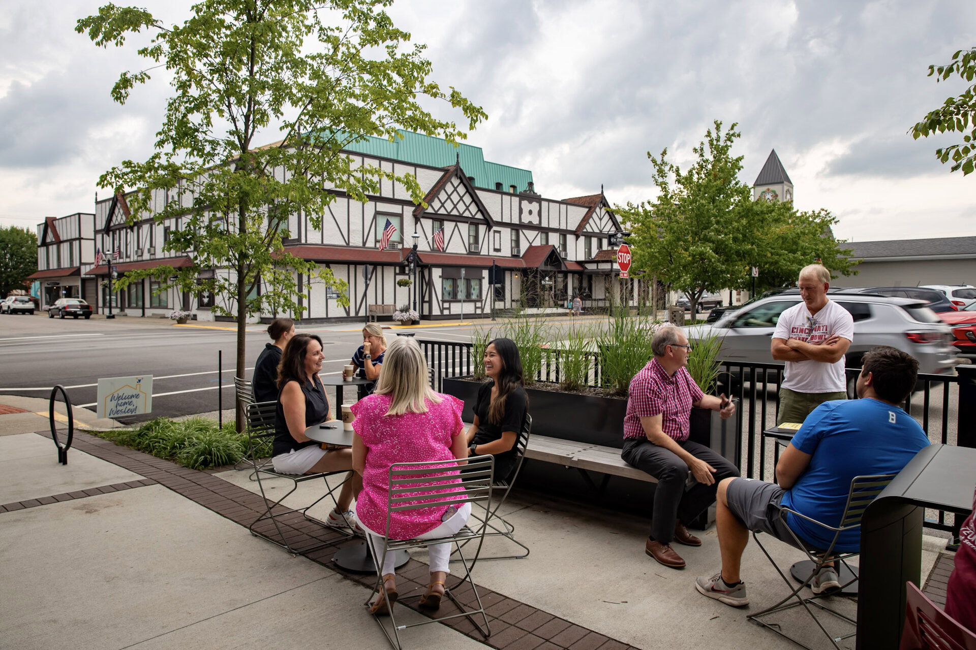 Charming downtown Batesville, Indiana with outdoor dining and historic architecture, showcasing vibrant community life on Main Street.
